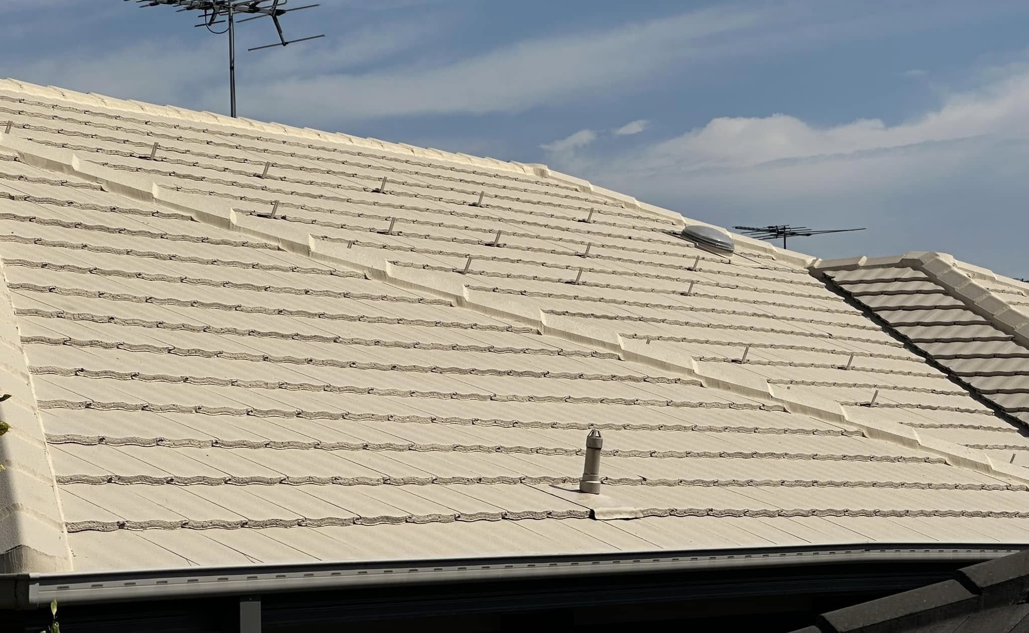 After — restored tiled roof detail