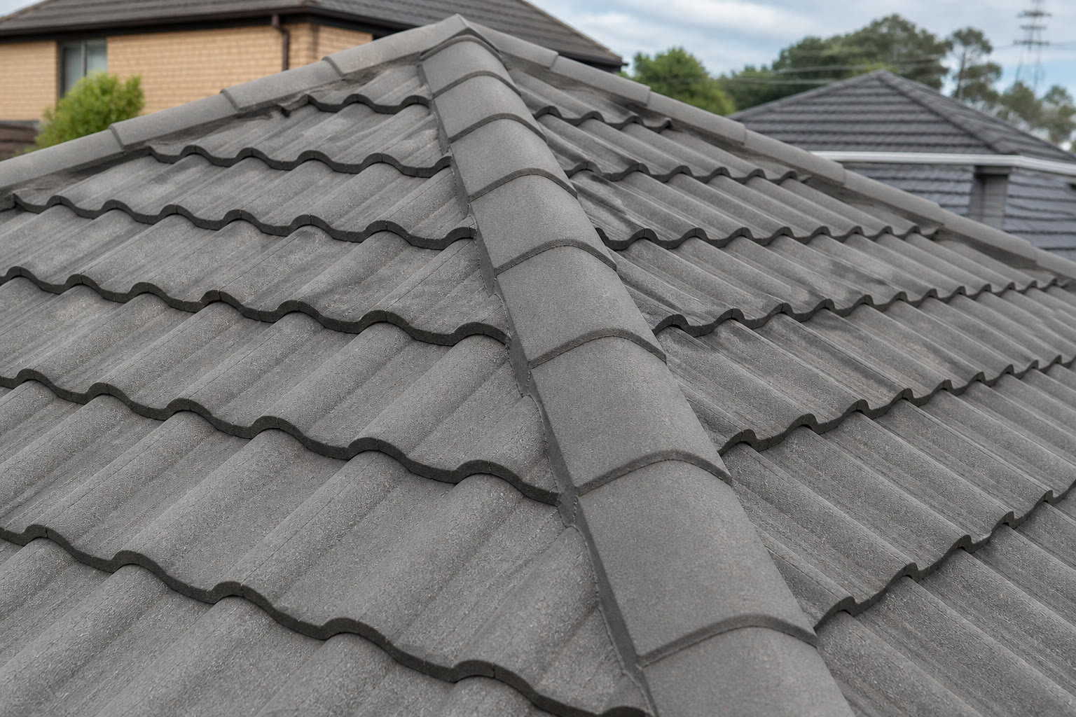 Same roof after broken tiles replaced